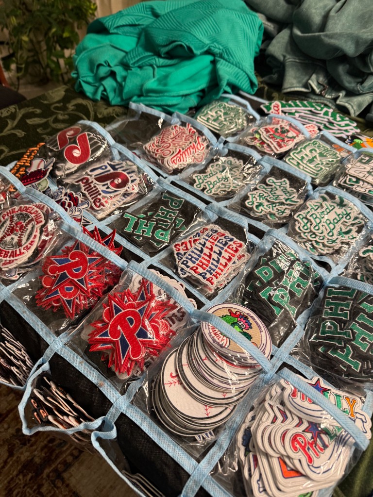 A patch organizer filled with Phillies and Philadelphia fan patches